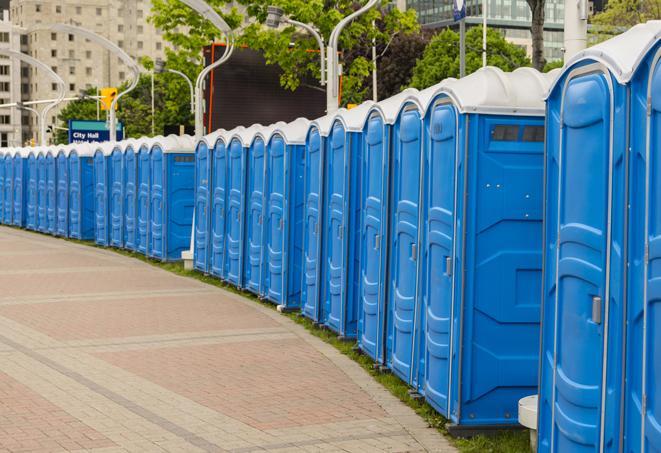 a row of portable restrooms at a fairground, offering visitors a clean and hassle-free experience in cerritos